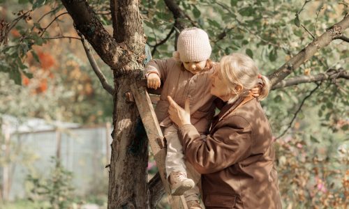 Child and grandma in garden